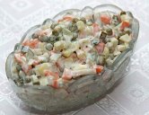 Салат из консервированных кальмаров: быстрые понятные рецепты